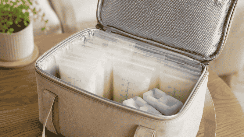 An insulated cooler bag with ice packs used to transport breast milk safely